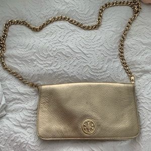 Tory Burch metallic gold clutch